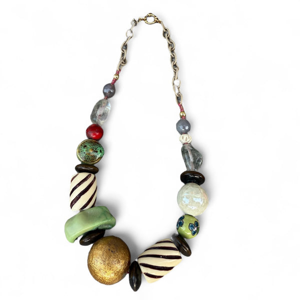 Colorful beaded necklace on a white background