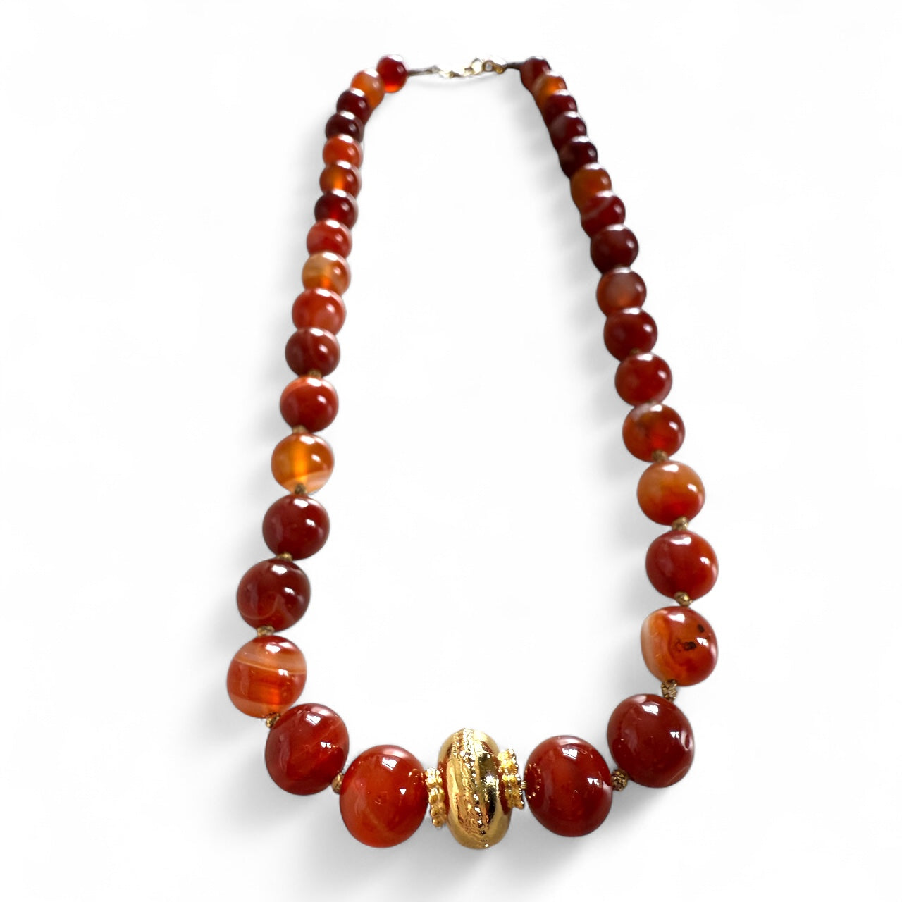 Necklace with red and gold Agate beads on a white background inamullumani 
