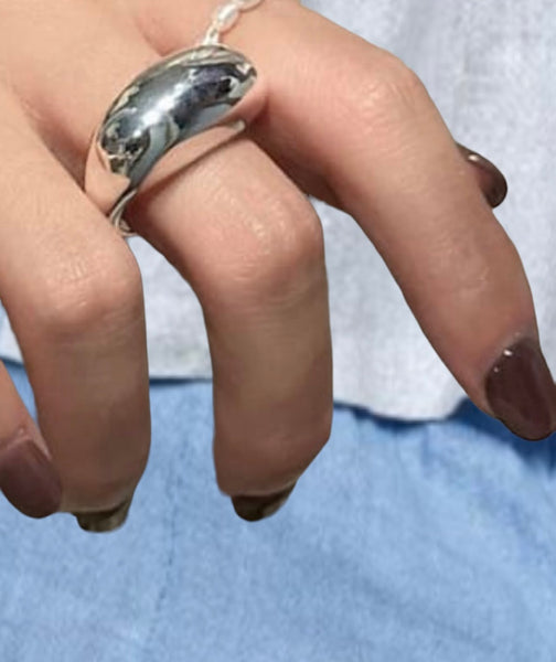 Suave silver ring on finger