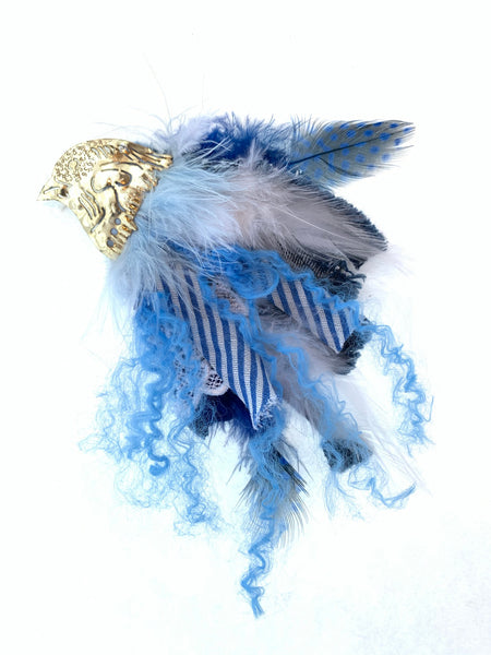 Silver bird brooch blue mix of material 